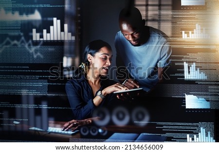 Adding modifications to their plans. Shot of two programmers using a digital tablet while working together on a computer code at night.