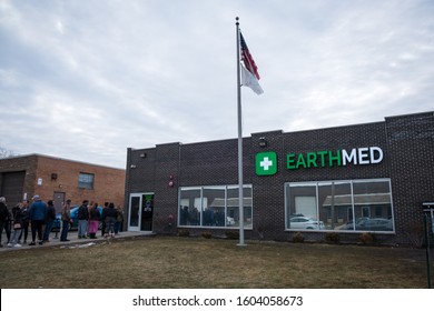 ADDISON, ILLINOIS - JANUARY 2, 2020: Lines of customers stretch outside EarthMed Medical Marijuana Dispensary after Illinois legalized recreational marijuana January 1, 2020