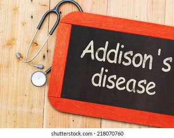 Addison's disease (adrenal insufficiency) written on chalkboard and stethoscope. 