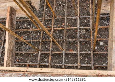 Additional reinforcement of the crosshairs of the strip foundation with metal reinforcement