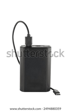 Additional self-contained external battery for charging mobile and other device. Power bank isolated on white background. Stylish charger (rechargeable battery) . Full depth of field.
