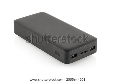 Additional self-contained external battery for charging mobile and other device. Power bank isolated on white background . Full depth of field.