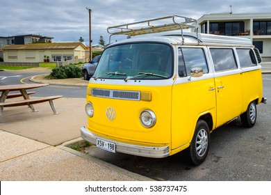 Adelaide, Australia - August 14, 2016: Classic yellow Volkswagen Transporter camper van parked on a street at Middleton beachfront