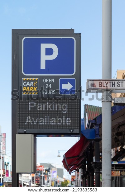 Adelaide,\
Australia - August 23, 2022: Parking Available CarE Park road sign\
in Hindley Street, South Australian\
CBD