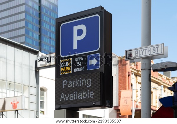 Adelaide,\
Australia - August 23, 2022: Parking Available CarE Park road sign\
in Hindley Street, South Australian\
CBD