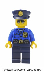 ADELAIDE, AUSTRALIA - January 09 2015:A Studio Shot Of An Policeman Lego City Minifigure From The Popular Lego Series. Lego Is Extremely Popular Worldwide With Children And Collectors.