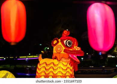 Adelaide, Australia - October 19, 2019: Lucky Dog Giant Lantern Carried Through Crowd Of People  During Moon Lantern Festival Celebration In Elder Park At Night