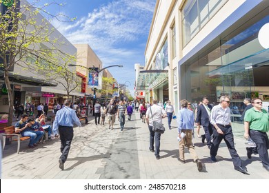 Adelaide, Australia - September 23, 2013: People Walking Along Rundle Mall In Adelaide, South Australia. Rundle Mall Is The Premier Retail Area Of South Australia And A Popular Tourist Attraction