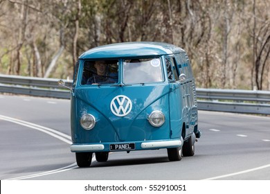 Adelaide, Australia - September 25, 2016: Vintage 1959 Volkswagen Kombi Van driving on country roads near the town of Birdwood, South Australia.  