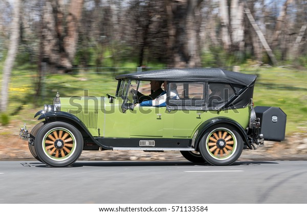 Adelaide, Australia - September 25, 2016:\
Vintage 1927 Essex Boat tail Roadster driving on country roads near\
the town of Birdwood, South Australia. \

