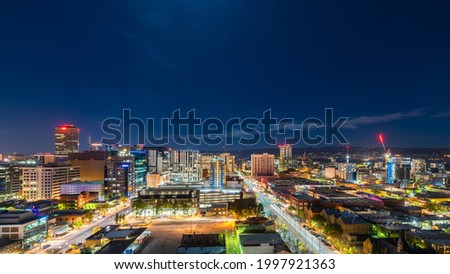 Adelaide city skyline illuminated at night viewed towards hills, South Australia