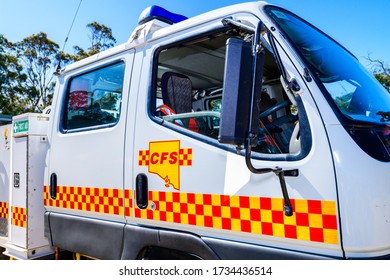 Adelaide Hills, South Australia - February 9, 2020: South Australian Country Fire Service Truck Door Fragment With CFS Logo In The Centre On A Bright Summer Day