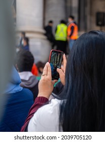 Adelaide, South Australia - August 29,2021: Someone Livestream The Protest On Facebook, In Front Of The Parliament House Of South Australia.