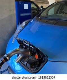 Adelaide, South Australia - February 12th 2021: Electric Vehicle In Charging Station.