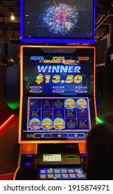 Adelaide, South Australia - February 12th 2021: Slot machine showing winning line in dollar currency.