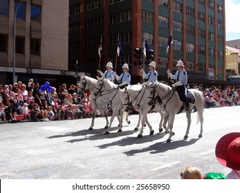 ADELAIDE, SOUTH AUSTRALIA - November 4, 2006: Police Greys (Horses) Lead The Adelaide Christmas Pageant, 2006.