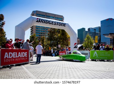 Adelaide, South Australia / Australia - October 20th 2019: Top Dutch Solar Racing teams car, Green Lightning, leaving the centre of Adelaide for final parade of the Bridgestone World Solar Challenge.
