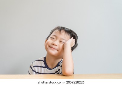 ADHD Concept.Thinking Asian Boy With Tired Face.Toddler Kid Looking Up And Think, Bored, Stubborn Child, Stressed Child, Kid With Bad Behavior Stubborn.mental Health.Autism Kid.online Learning At Home