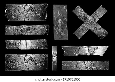 Adhesive Aluminum Silver Metal Foil Scotch Sticky Tape Pieces. Isolated Torn Shabby Rough Authentic Elements Set on a Black Background.