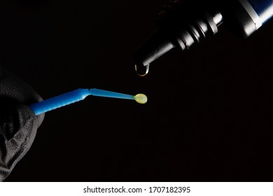 Adhesive Drop And Dental Brush