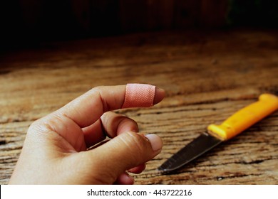adhesive plaster fingers , woman fingers after use knife