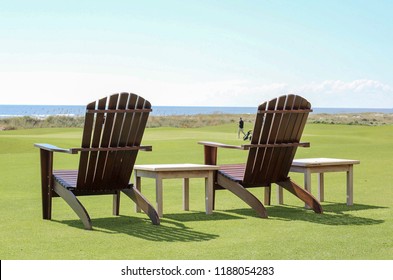 Adirondack Chairs Sitting On Golf Course On Kiawah Island, South Carolina Outside Of Charleston