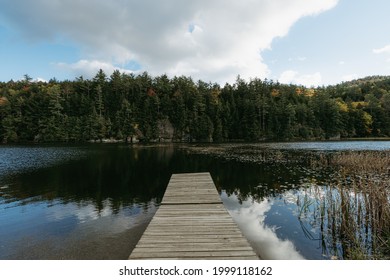 Adirondacks, NY, USA - June 29 2021: Mountains With Spring Water And Blue Sky Scene. Green Untouched Forest Landscape. Summertime In Adirondack Mountains. Upstate New York.