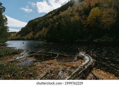 Adirondacks, NY, USA - June 30 2021: Mountains With Spring Water And Blue Sky Scene. Green Untouched Forest Landscape. Summertime In Adirondack Mountains. Upstate New York.