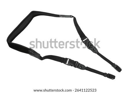 Adjustable black tactical sling strap with clips and padded shoulder section, isolated on white background.