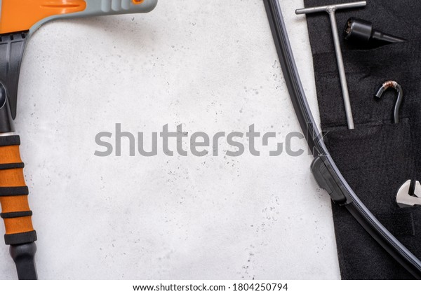 Adjustable and spanner, hexagon\
and wiper blade auto equipment. The wrench steel tools for repair\
and hexagon tool or allen wrench set on light gray\
background.