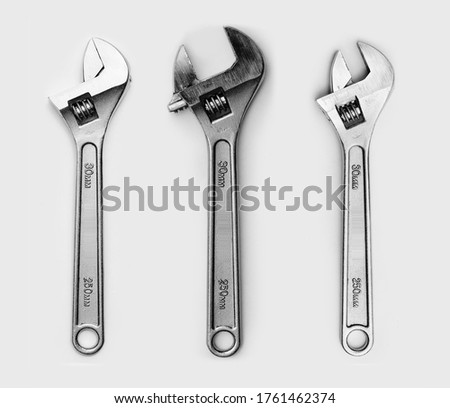 Adjustable spanner set. Chrome vanadium adjustable wrench top view. Hand wrenches in different sizes.