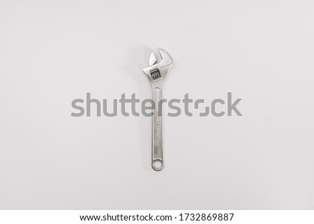 adjustable wrench construction wrench on a white background isolation. Copy space on top. Construction Tools Sale Concept.