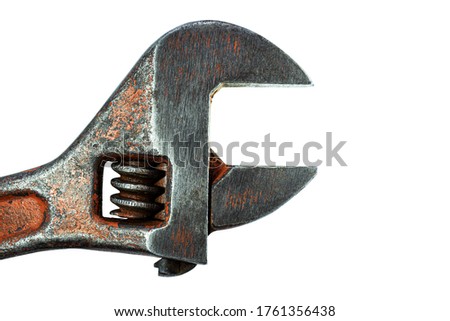 Adjustable wrench. Plumbing work in construction. Tool for work. Close-up. Isolated background.