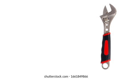 Adjustable wrench, work tool. Isolated on white background. Copy space, template.