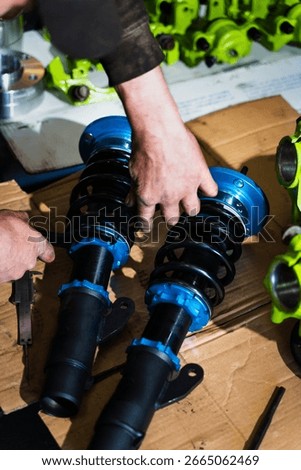 Adjusting coilover height and preload with micrometer precision ensures optimal balance and weight distribution on purpose-built drift car. Measuring Coilover before installing on drift car project