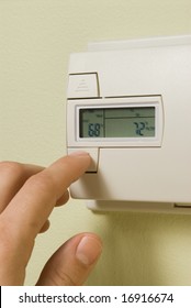 Adjusting A Home Thermostat To Save Energy