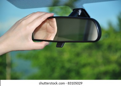 Adjusting Rear View Mirror