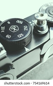 the adjusting ring on the old camera on white background