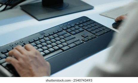 Admin in data center designing, implementing and managing gear to ensure optimal performance and reliability. Close up of expert typing on keyboard in server room, coding on computer, camera A