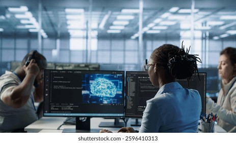 Admin in data center using artificial intelligence computing simulating human brain thought processes in computerized model. Employee working with AI machine learning algorithms, camera A