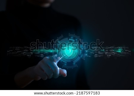 Admin hand touch protective shield on the virtual screen. Concept of internet attack prevention, data protection, corporate security, cyber defense technology.