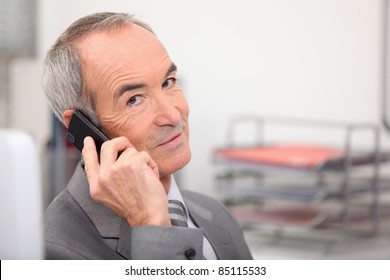 Admin Worker With Mobile Telephone