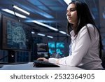 Admin working on PC in data center with artificial intelligence technology to process massive datasets. Worker solving tasks in server hub storing data used for deep learning