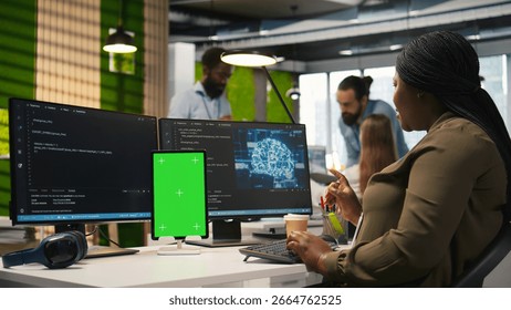 Admin writing code on isolated screen tablet, developing machine learning APIs. IT specialist using chroma key device to troubleshoot software errors using artificial intelligence, camera A