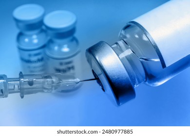 Administer the Covid-19 vaccine with a syringe. SARS-CoV-2 virus vaccine. RNA vaccines