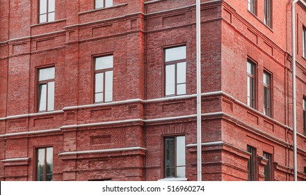 Administrative commercial building. Brick building with windows in modern classic architectural style - Shutterstock ID 516960274