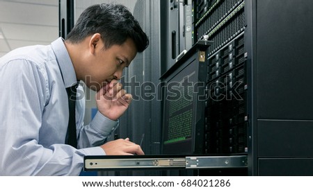 Administrator serious working with system in data center