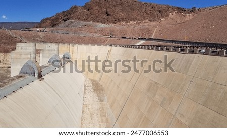 Admire this depression-era engineering marvel : the hoover dam, an Arch-weight dam on the Colorado River in the United States