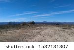 Admiring the desert-like scenery below the bright blue sky approaching Sassafras Mountain