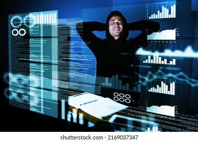 Admiring A Job Well Done. Portrait Of A Satisfied Computer Programmer Looking At His Work Late At Night.